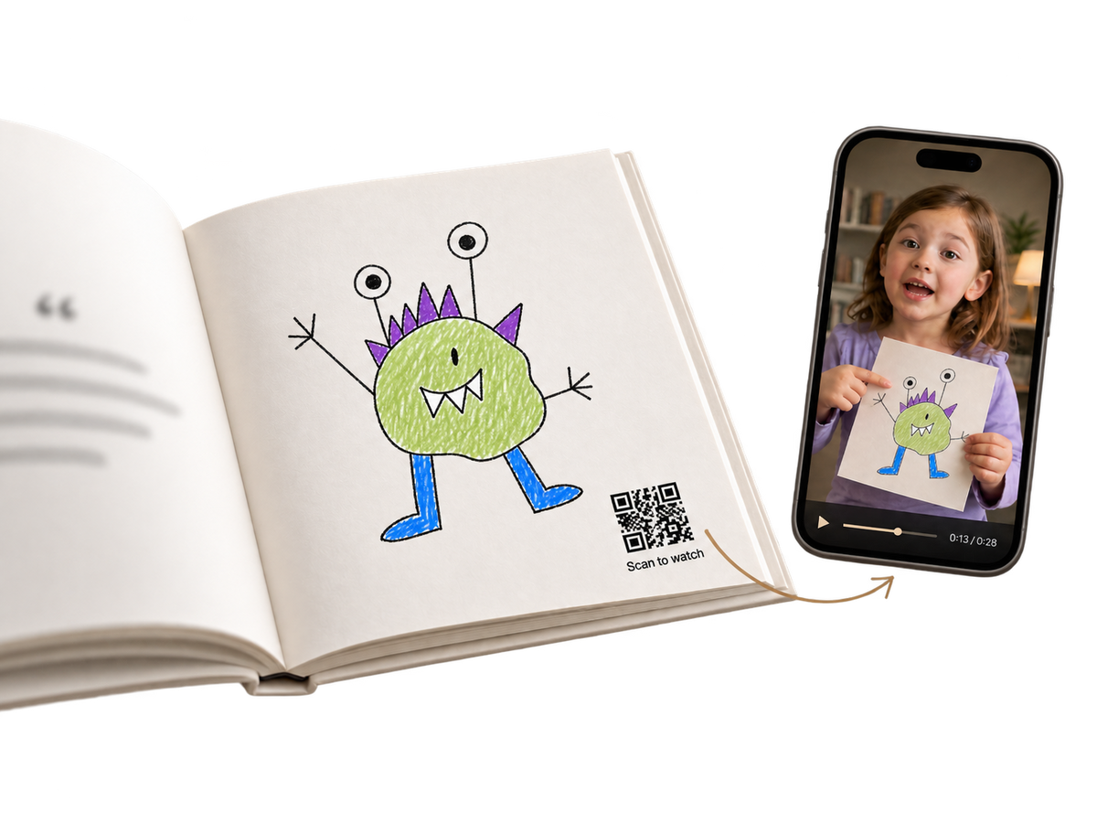 Open matte-white Trove book showing a photographed keepsake, a printed QR code and the child explaining the same keepsake on a phone
